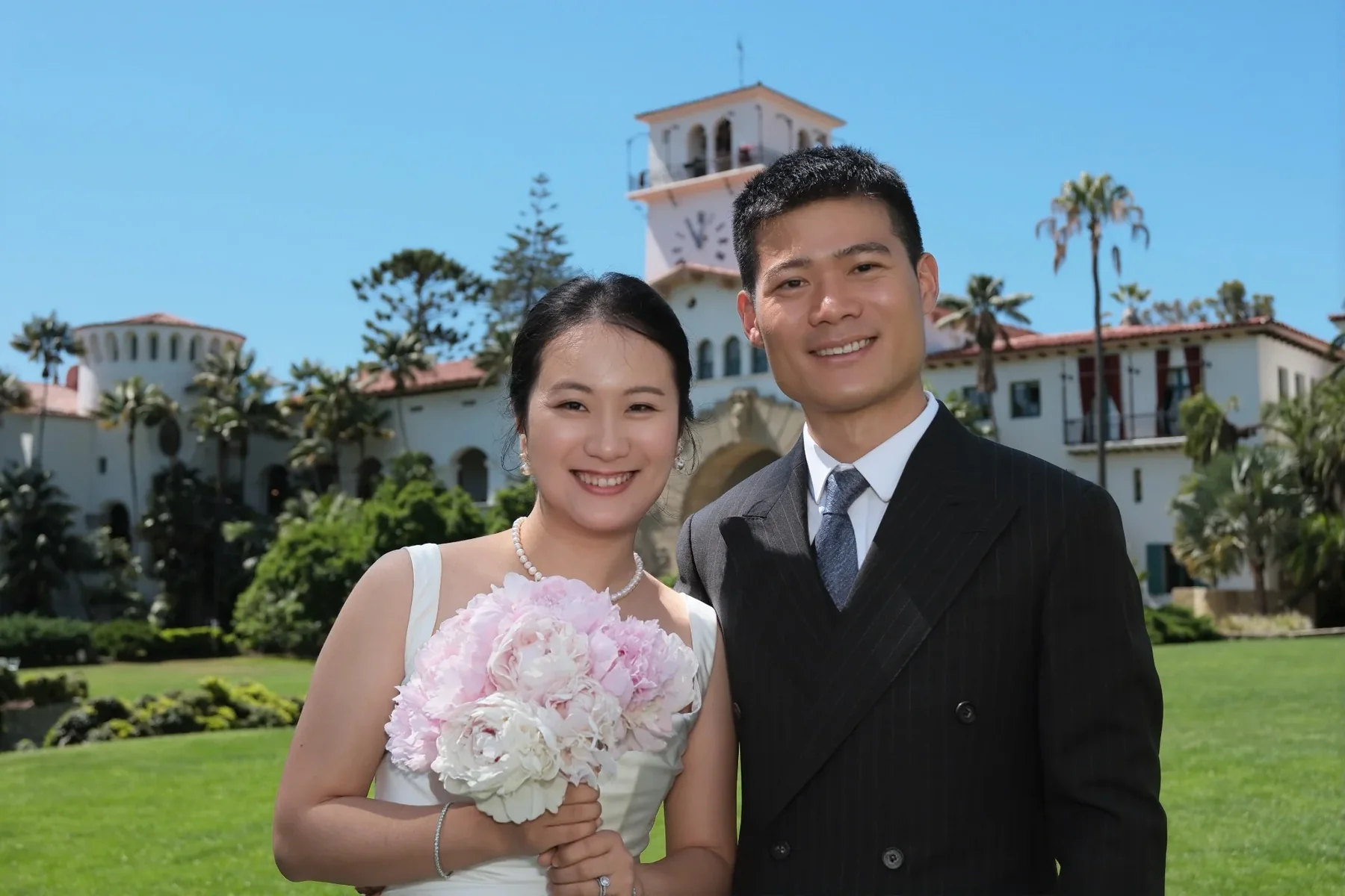 Erge and Long celebrating their marriage