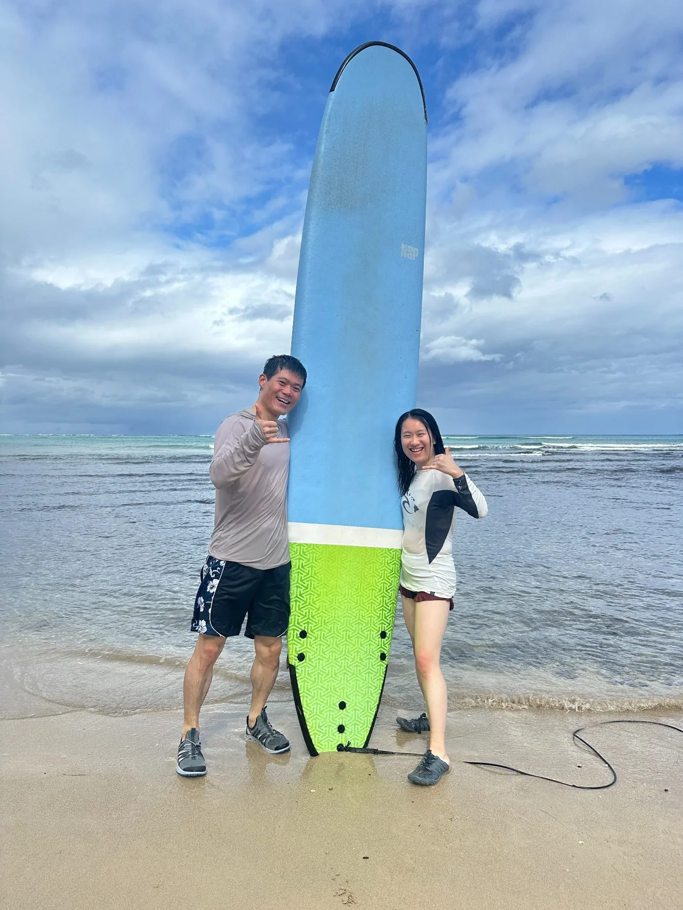 Erge and Long surfing in Hawaii