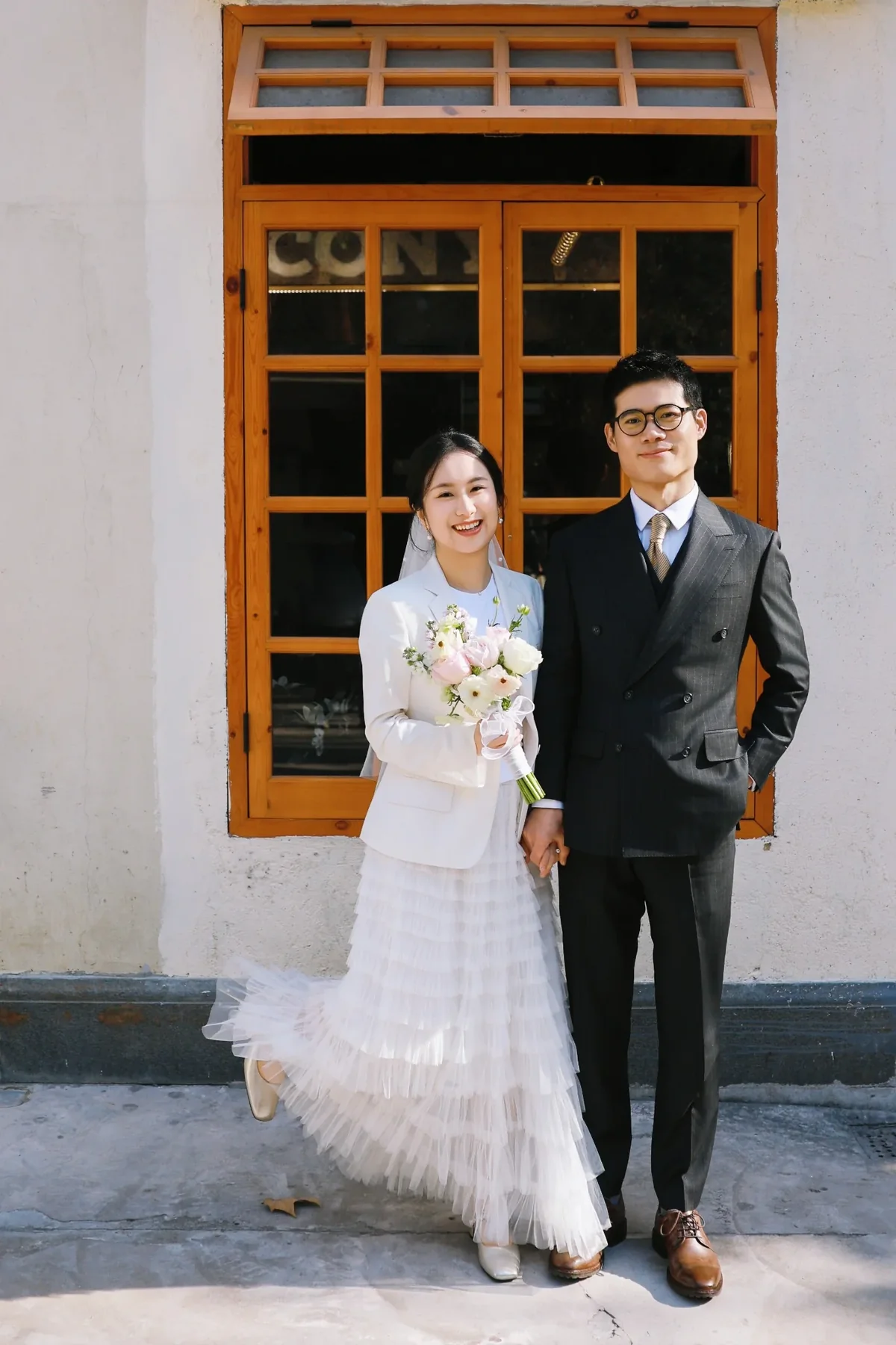 Erge and Long together on their wedding day